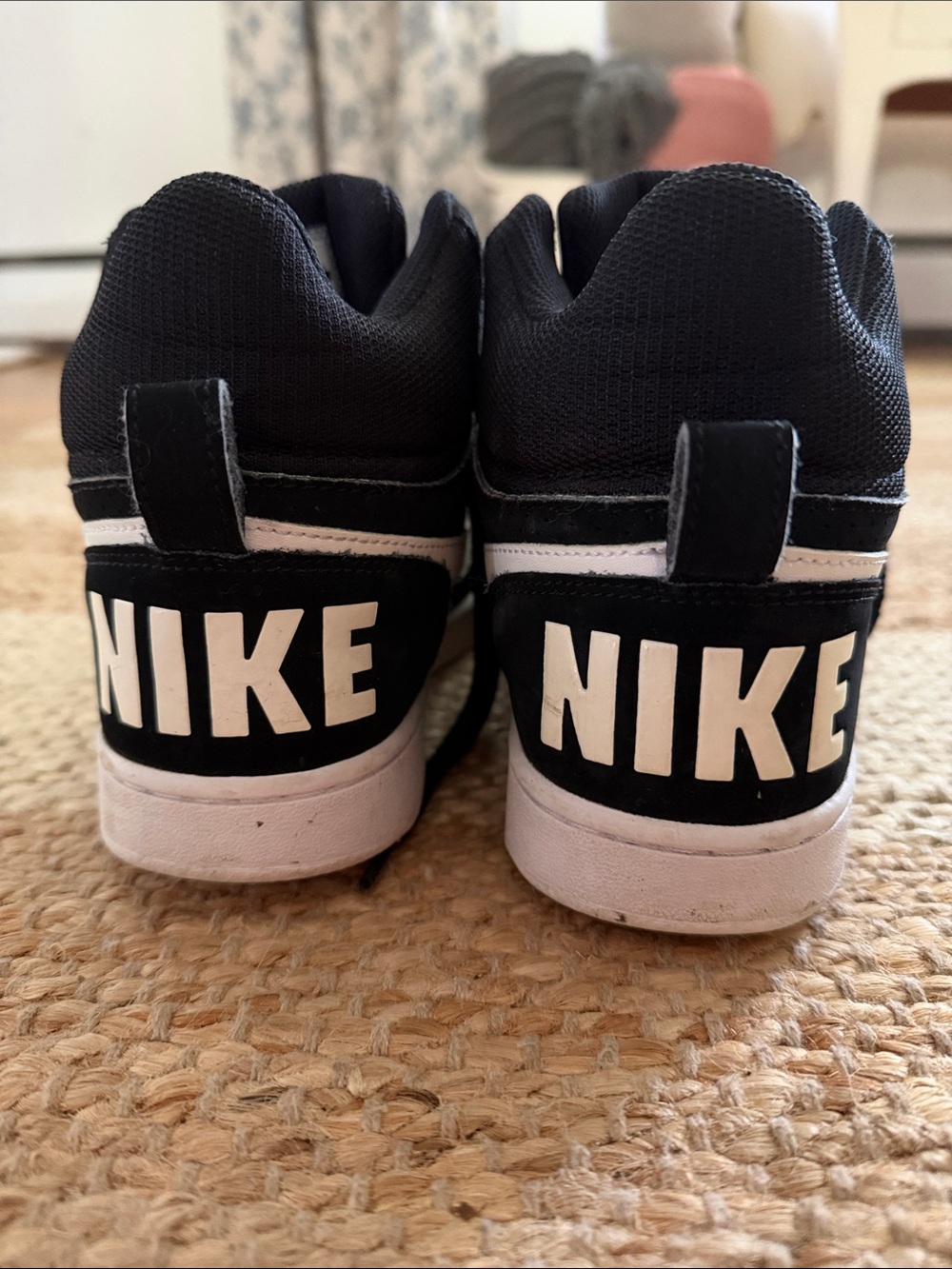 Nike Black and White High-Top Sneakers with Bold Logo